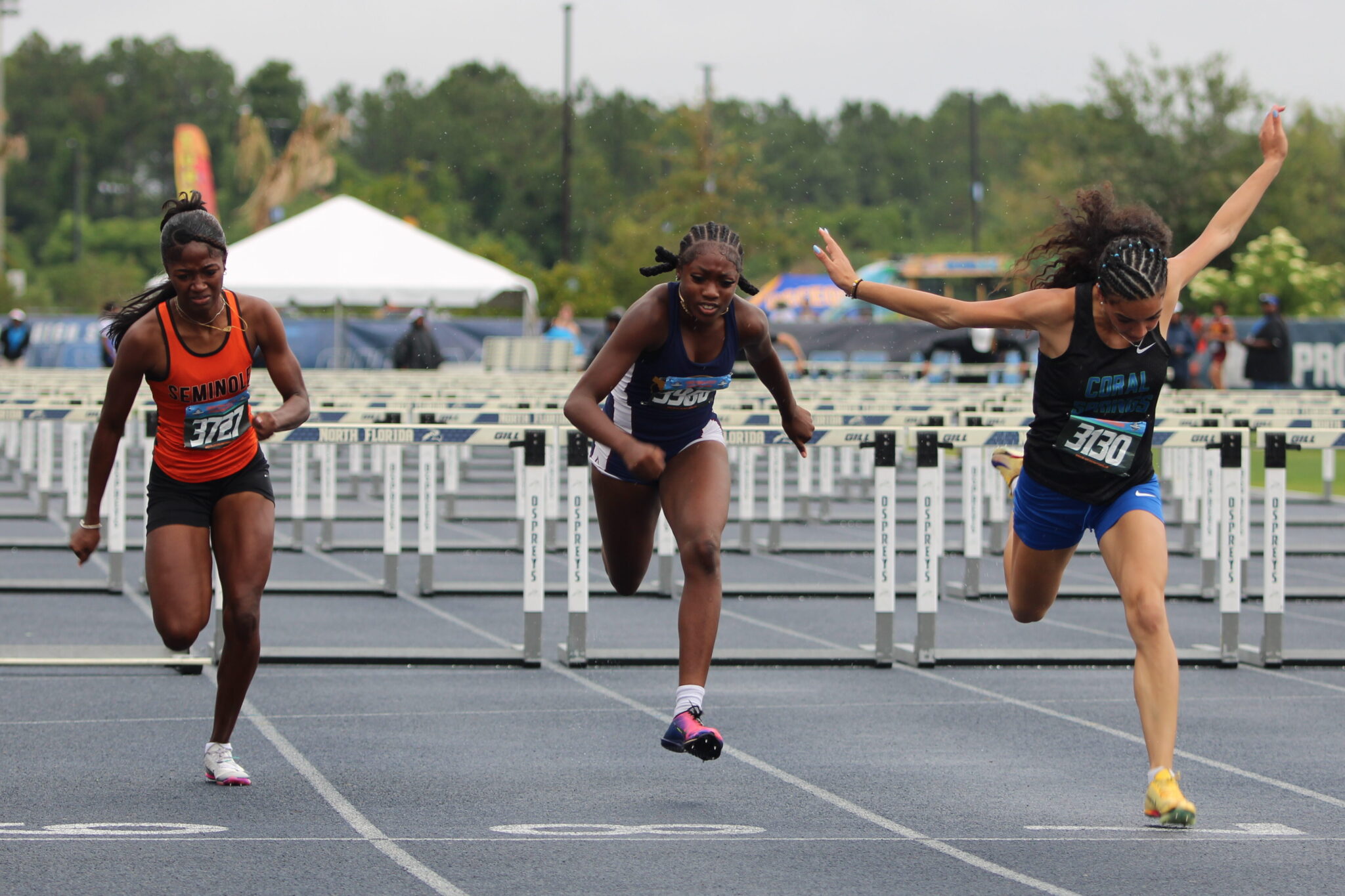 Te'Ariel Harley places top 8 in the 100m hurdle to put her on the podium and award her a state medal.