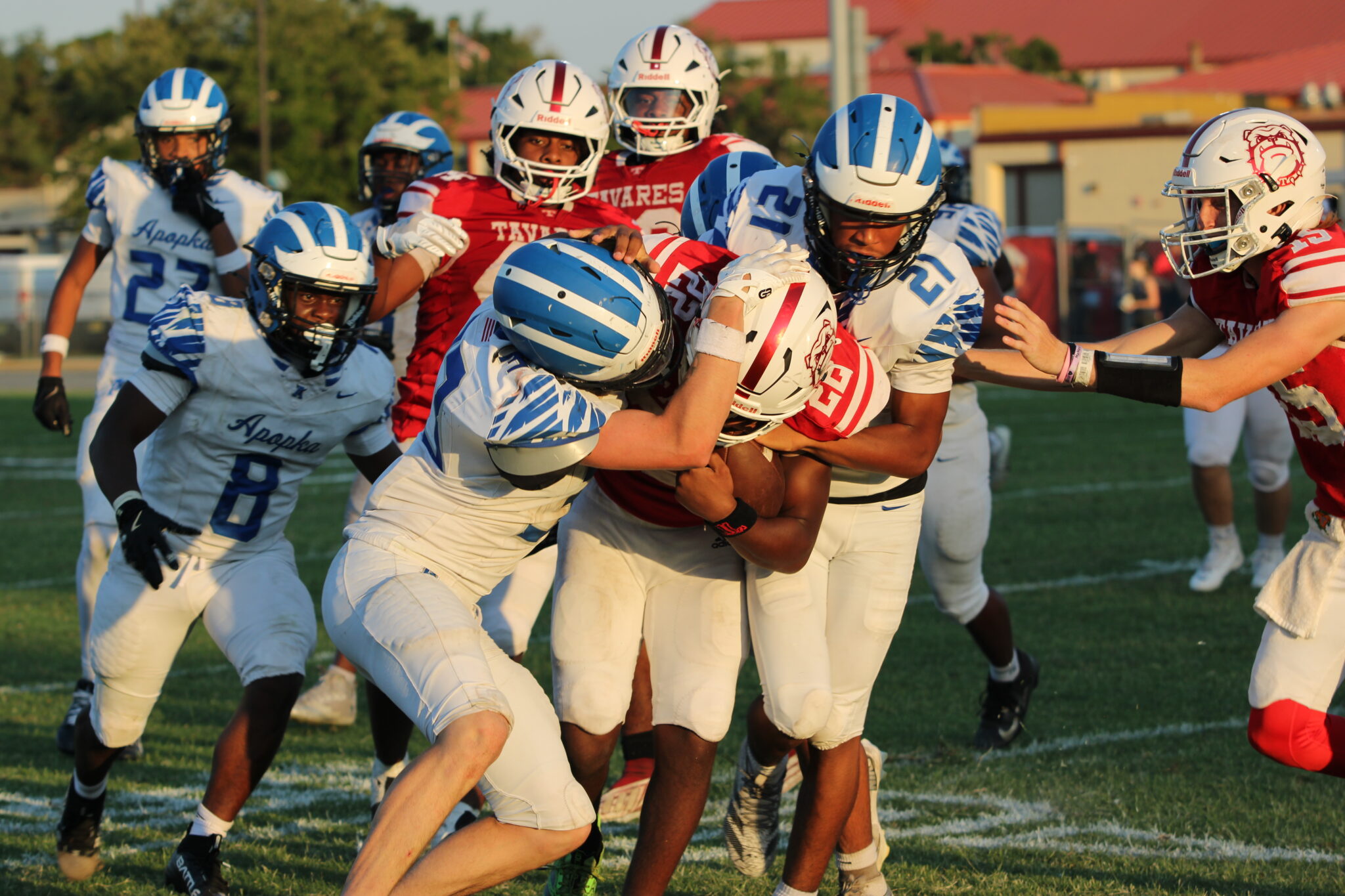 Teagan Roberts (33) and Irish Ferrer tackle the Bulldog ballcarrier