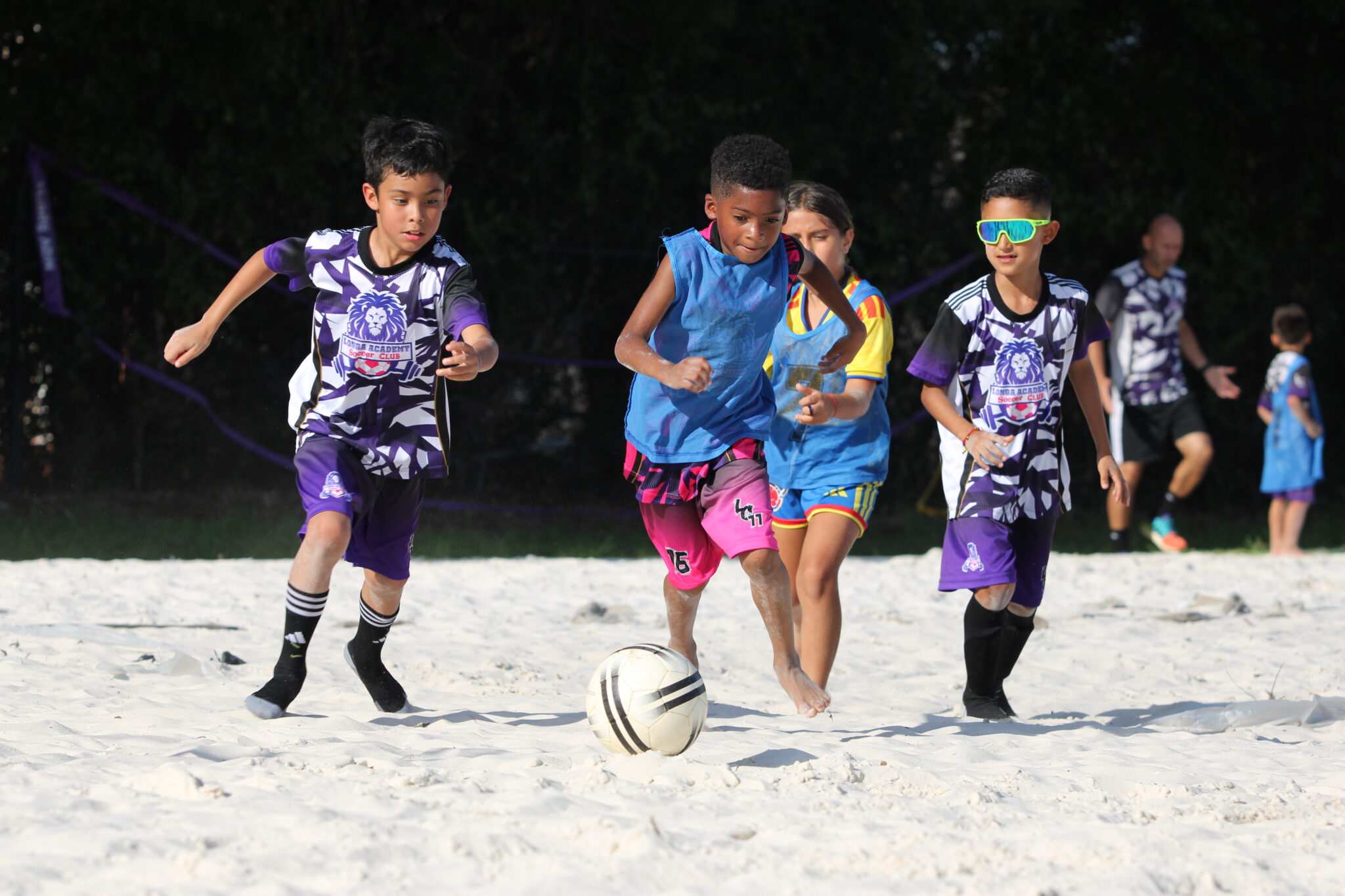 The Longa Academy futures program finishes off their training with a 2 on 2 round of beach soccer.