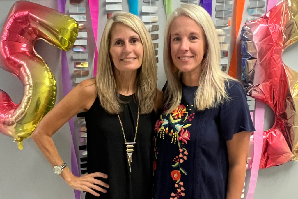 Mary Block (left) and former student April Ware (right) pose for a picture.