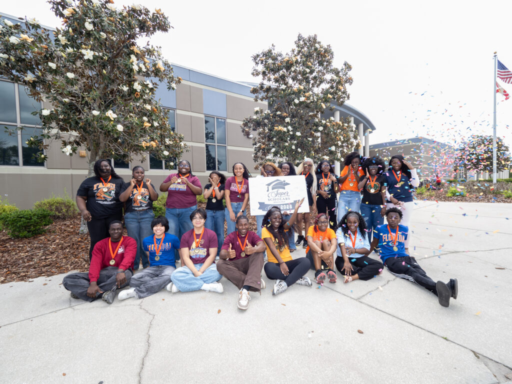 Wekiva High School Super Scholars celebrate with confetti.