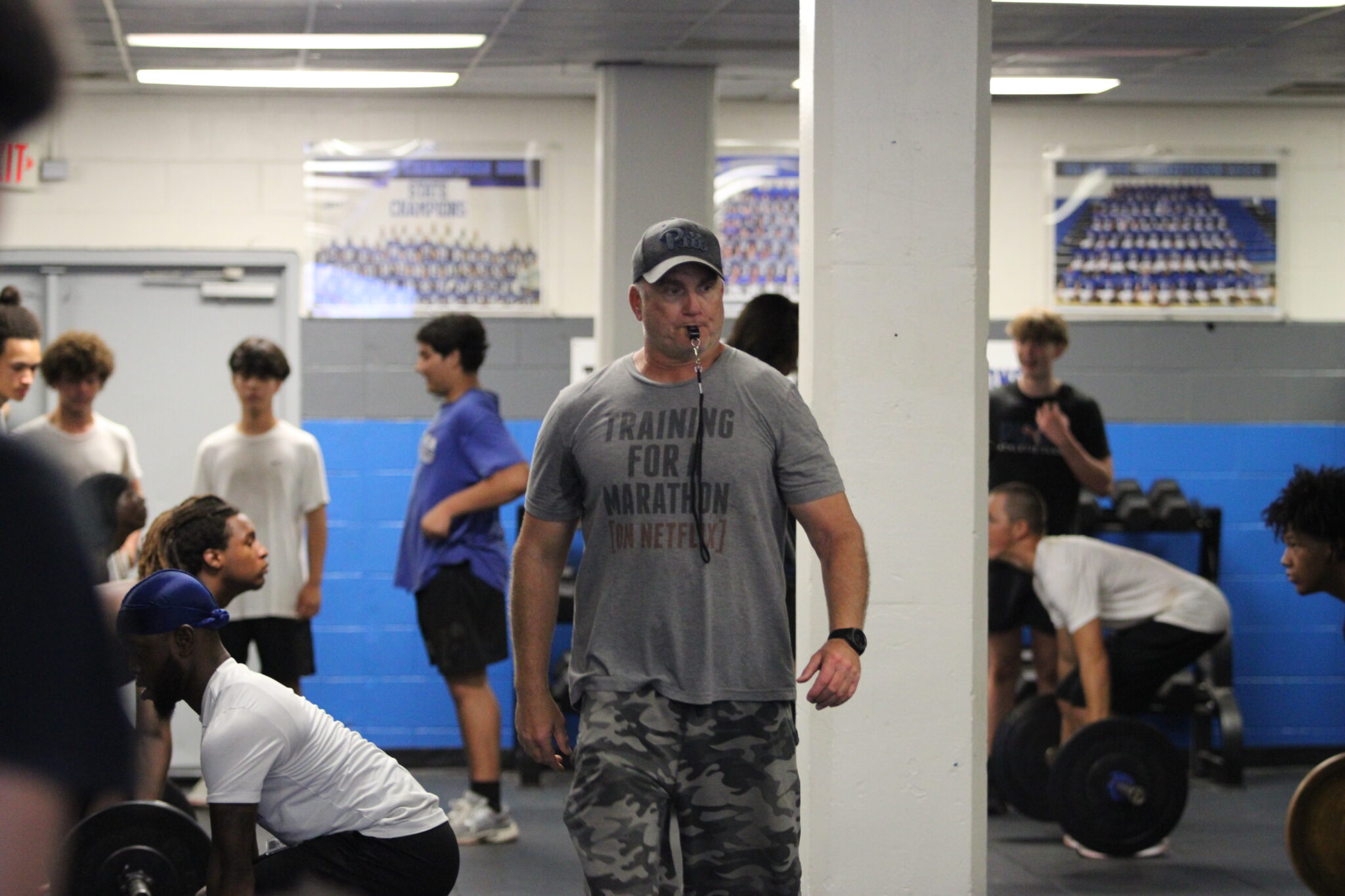 Coach Matt Anderson runs a workout in the Phil King weight room.