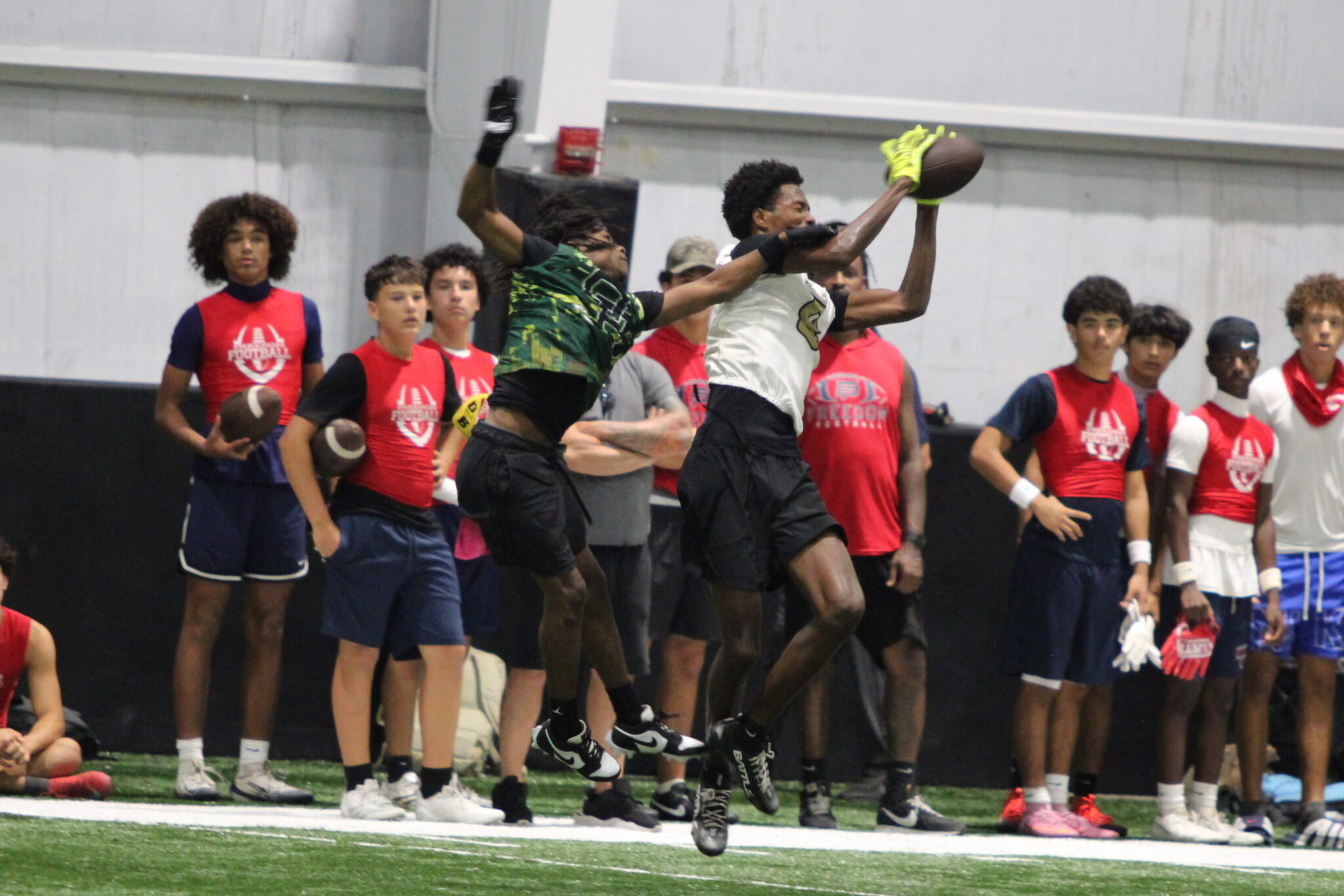 DeAndre Adams makes a strong contested grab for a 20-yard completion.