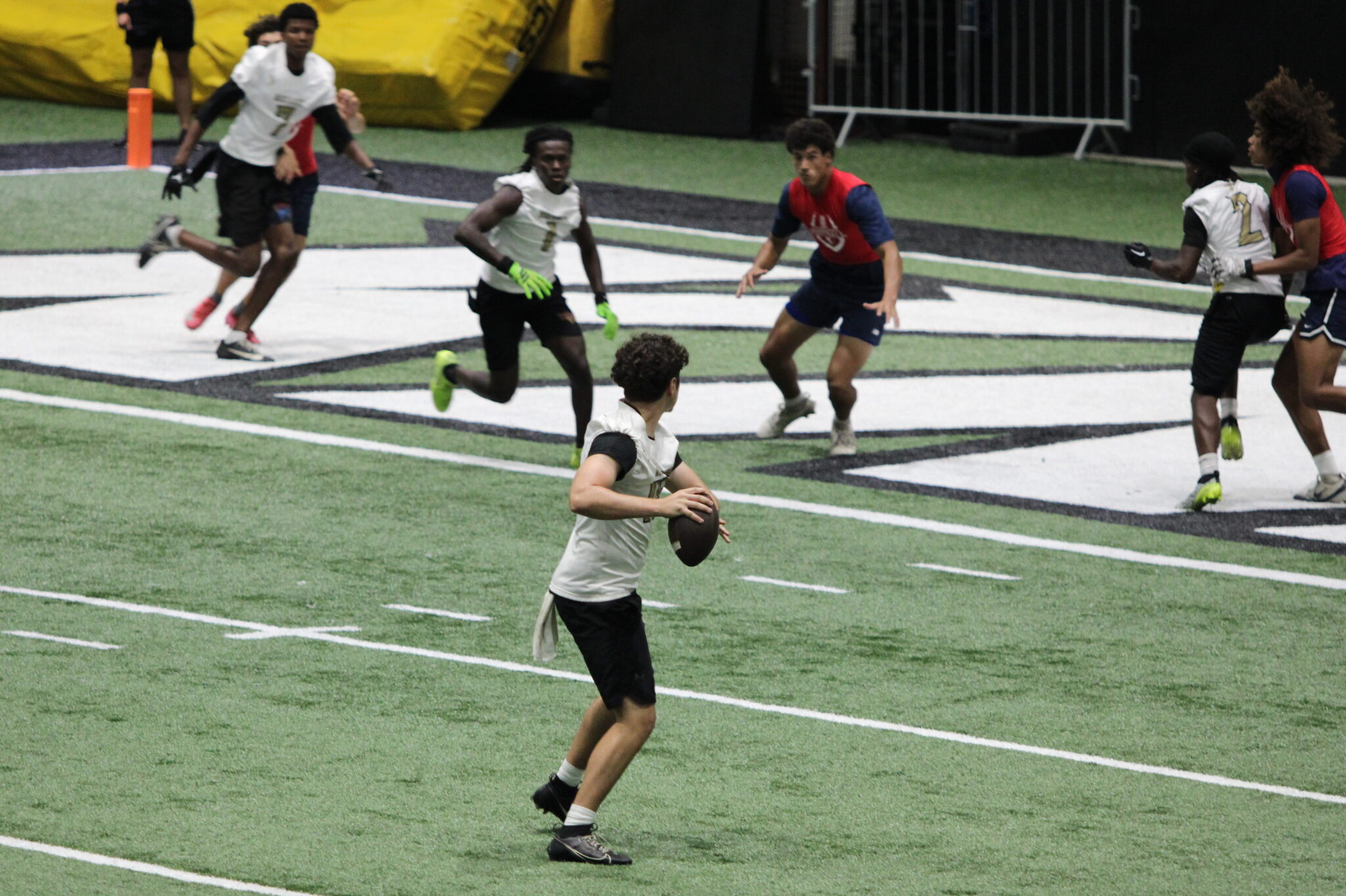 Dominick Sanguine drops back and looks to throw into the endzone.