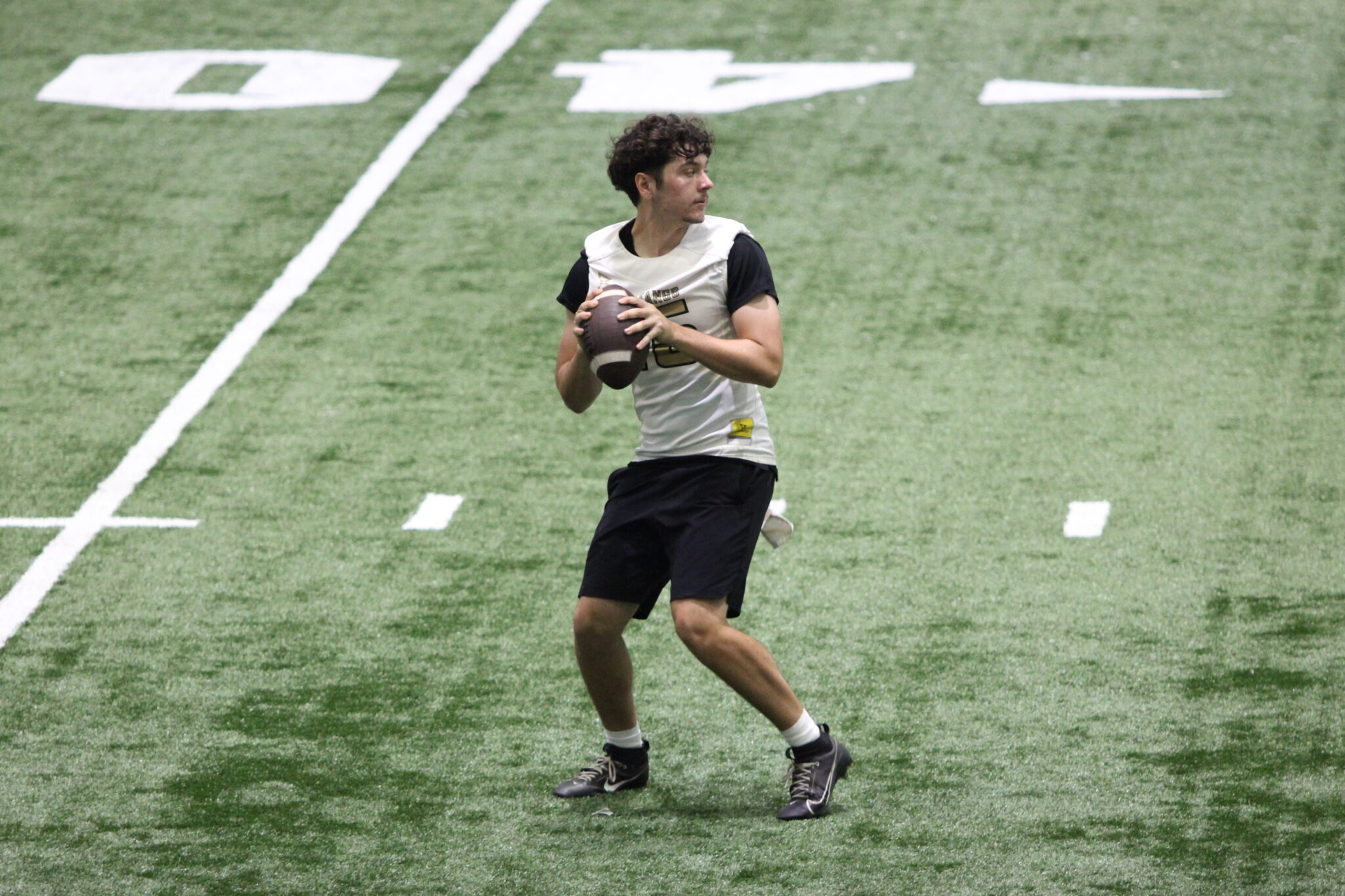 Dominick Sanguine drops back to pass against Freedom.