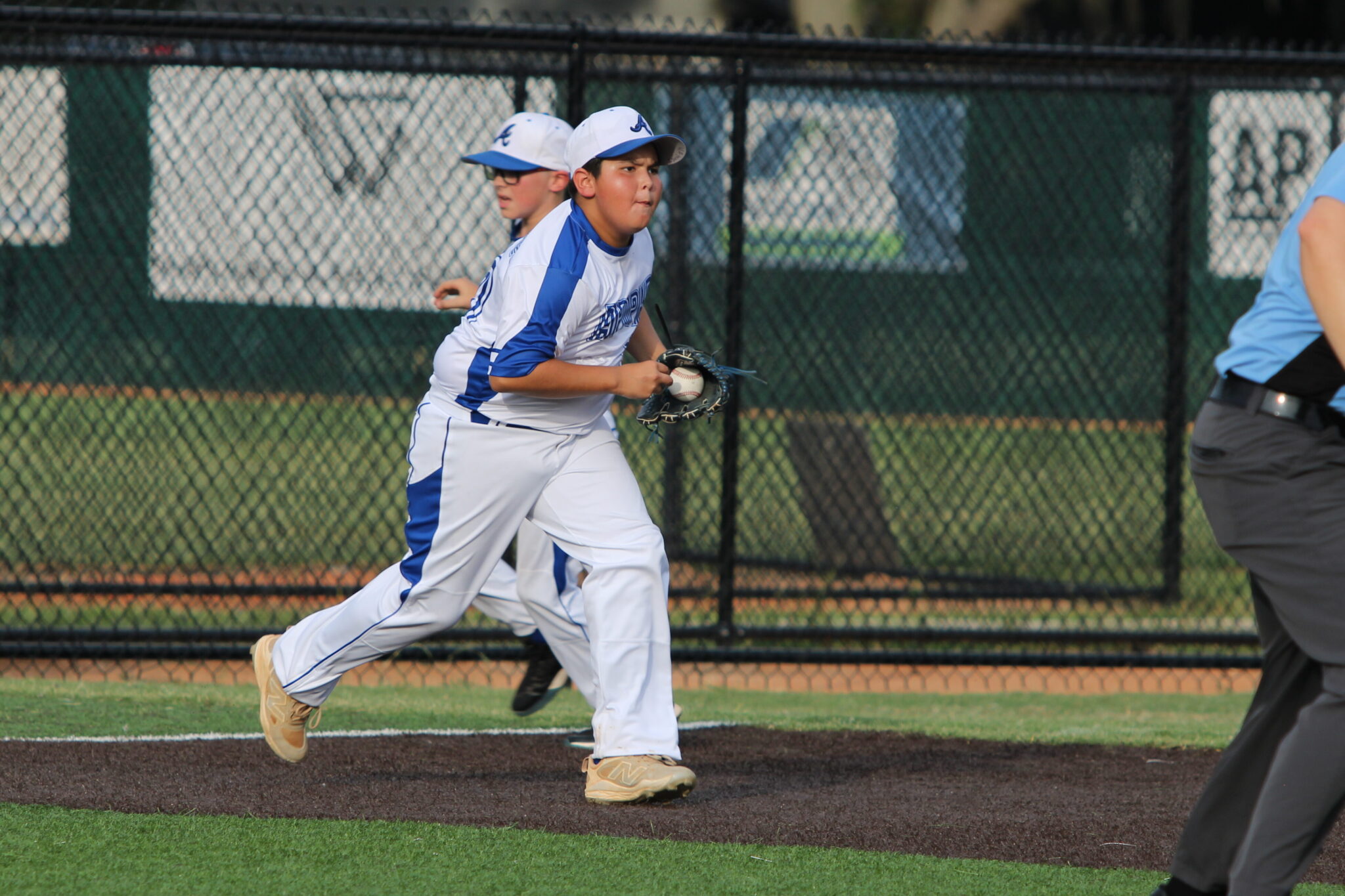 Isaiah Gonzalez runs down a runner from third base.
