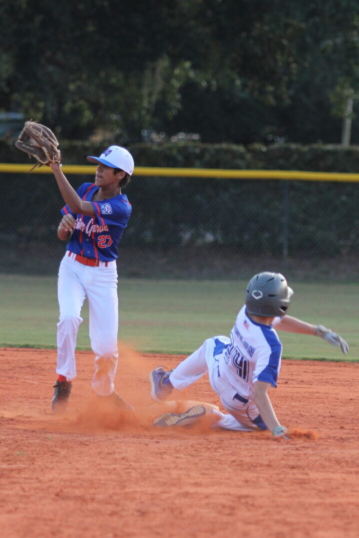 Jake Conlon slides in safely to second after his hit in the fourth inning.