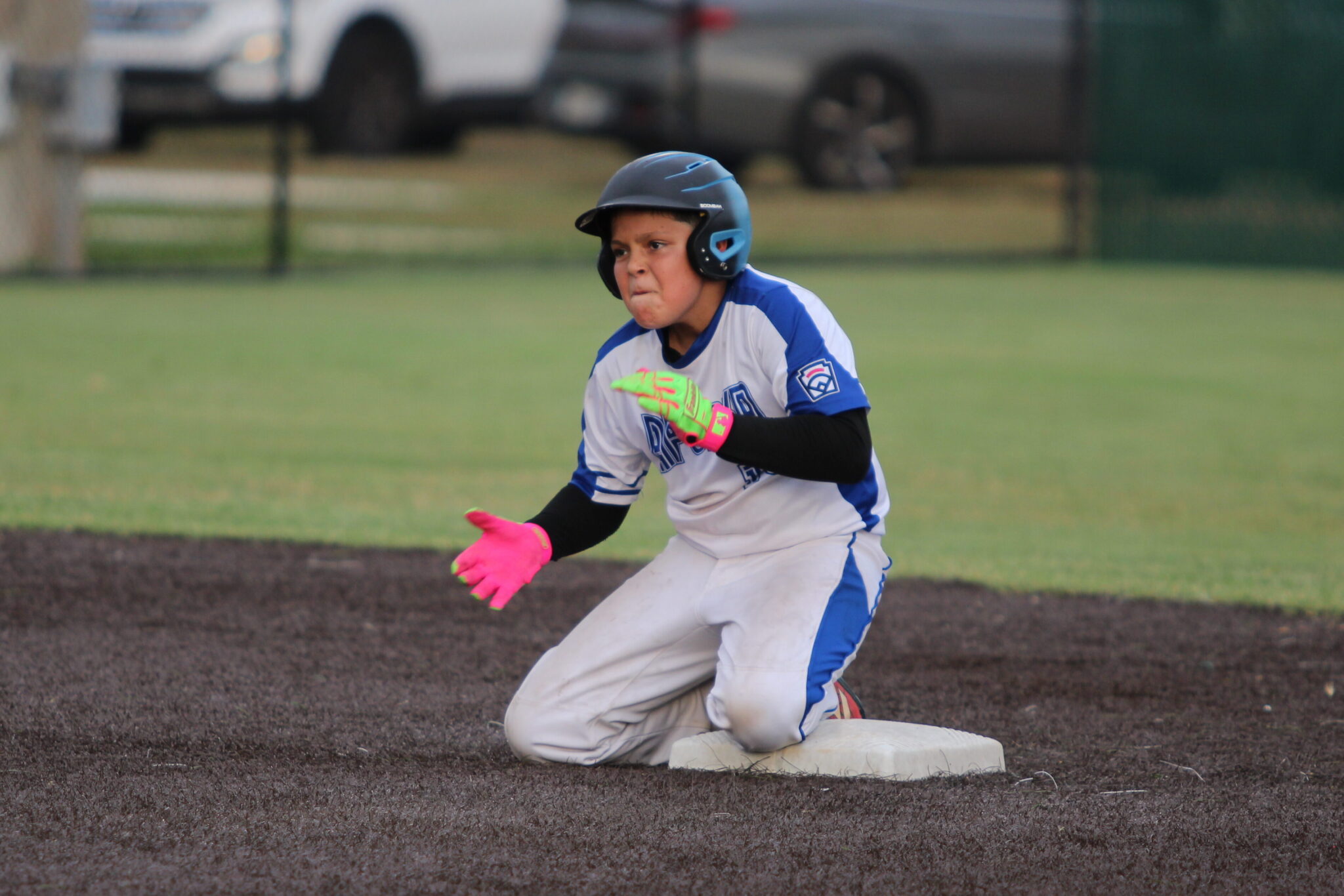 Jordan Childs hyped up after reaching second base from his hit into the outfield.