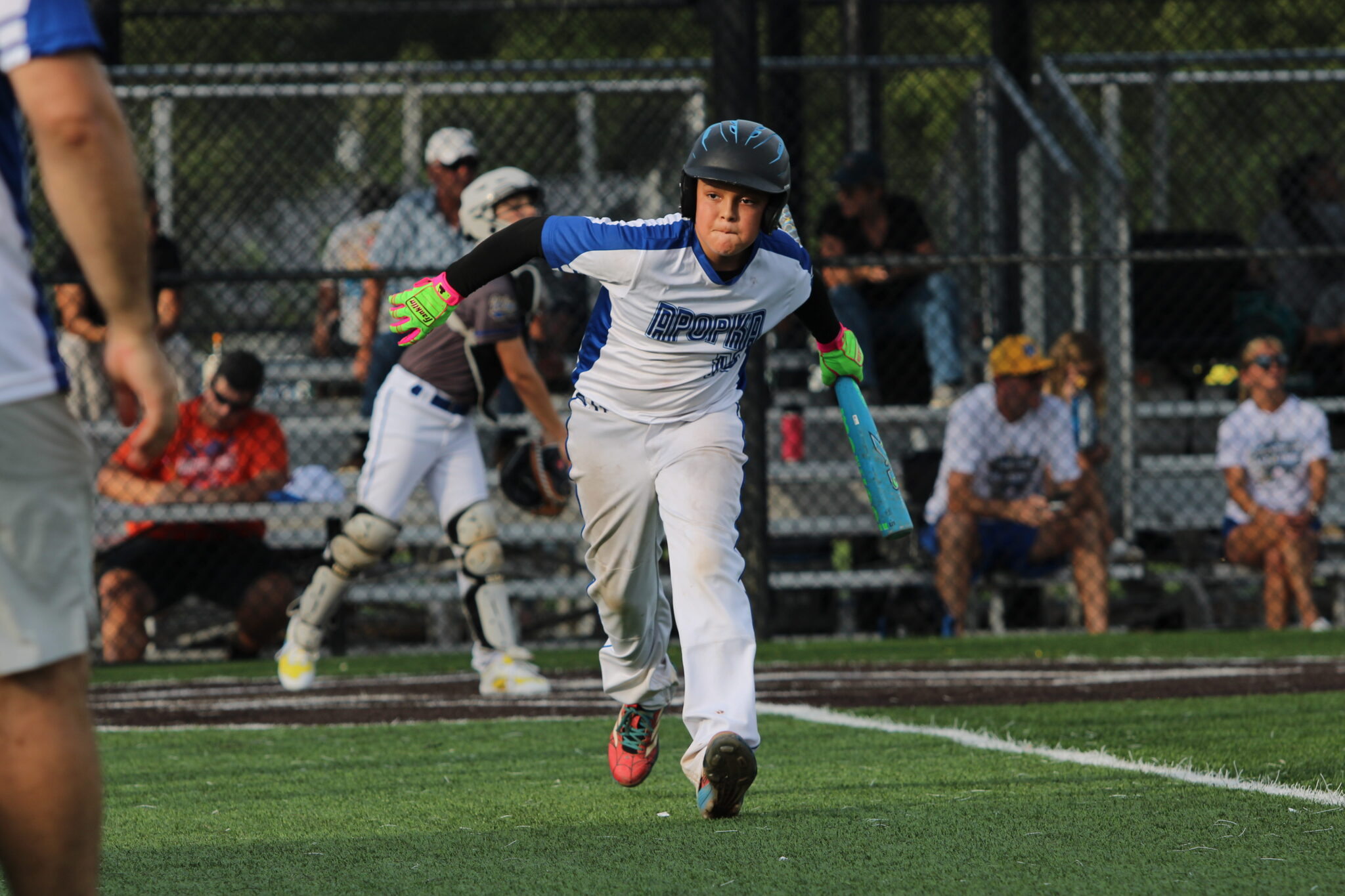 Jordan Childs tosses his bat towards the dugout after working a walk in the bottom of the second inning.