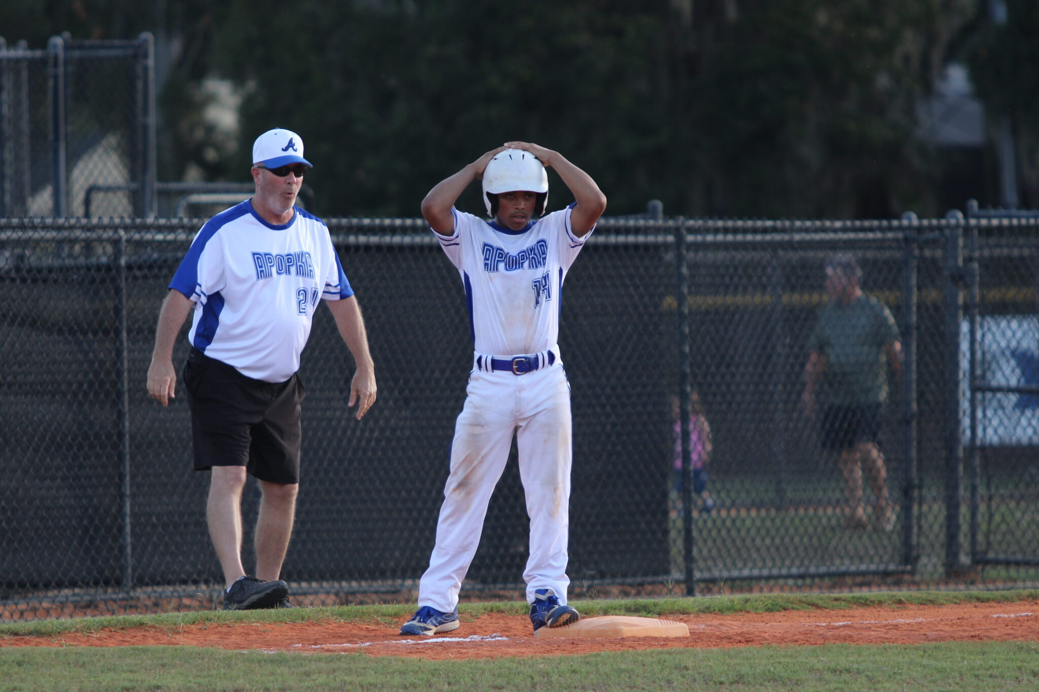 Jorge Santiago stands on third after his two RBI triple in the gap.