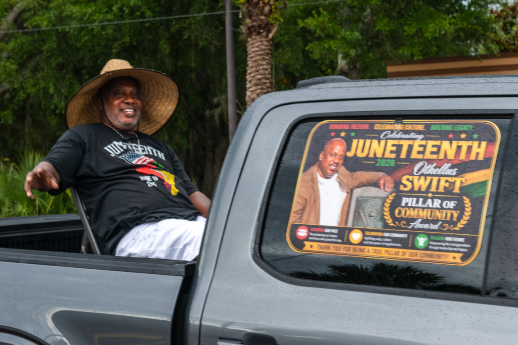 Othellus Swift, the 2026 Pillar of the Community Award recipient, rides in the June 20 Apopka Juneteenth Parade. Organizers recognized Swift for his longstanding service to the community.