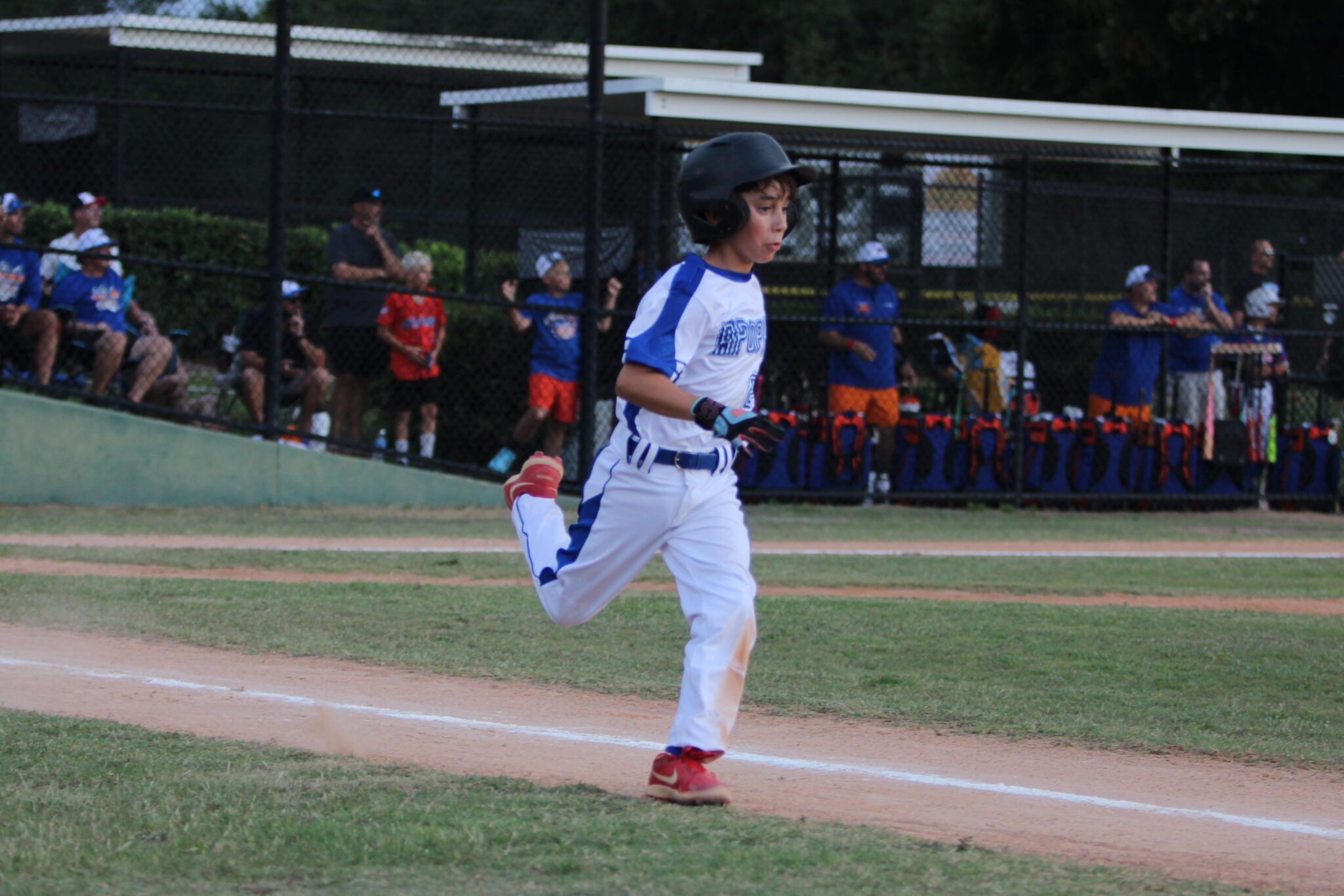 Landon Frye gets ready to round first after his hit into the outfield.