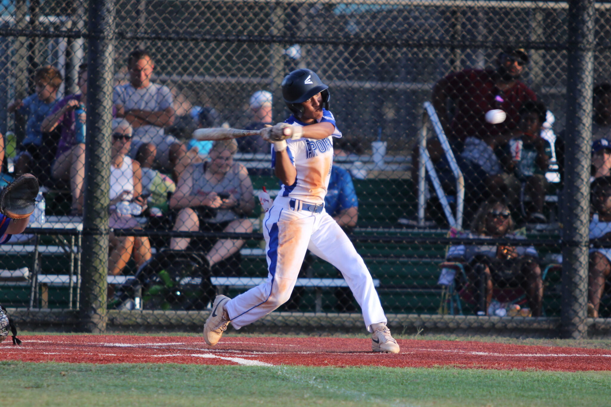 Maddox Thompson keeps his eye on the ball and rips it.