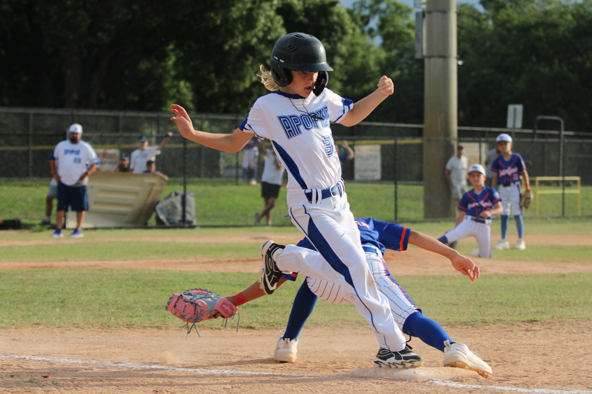 Matix Stirling attempts to beat the throw at first base after his hit in the second inning.