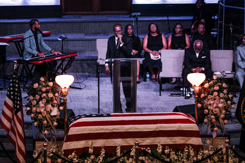 Reverend Gerard Moss of St. Paul African Methodist Episcopal Church delivers the eulogy for Specialist Mariyah Collington.