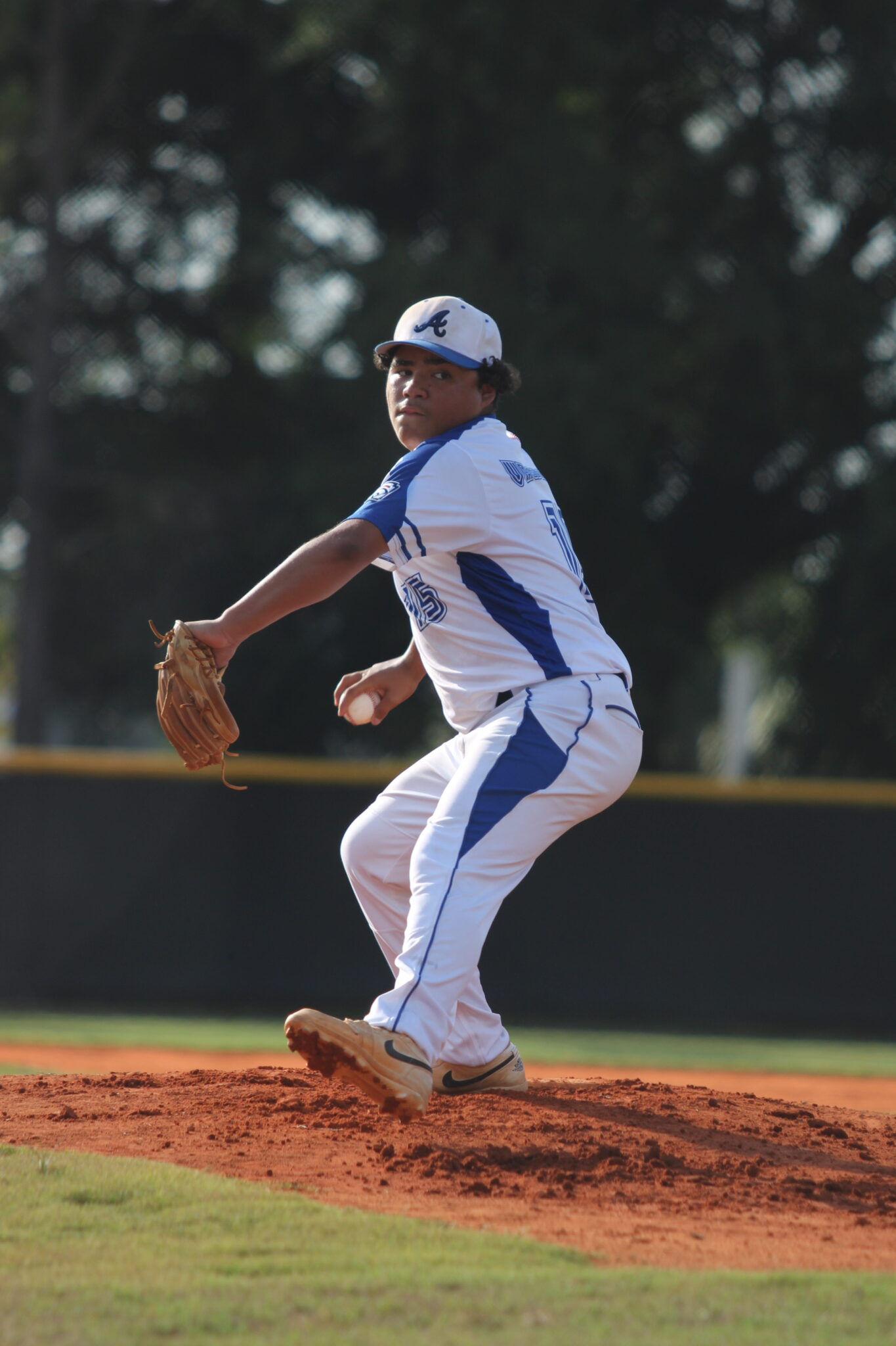 Sebastion Vasbinder steps through the mound in the first inning against Winter garden.