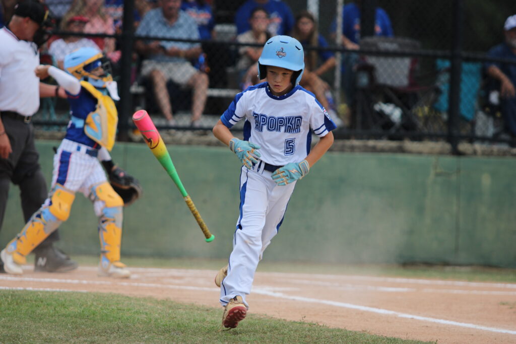 Tanner Adams tosses his bat to the dugout after working a walk in the first inning.