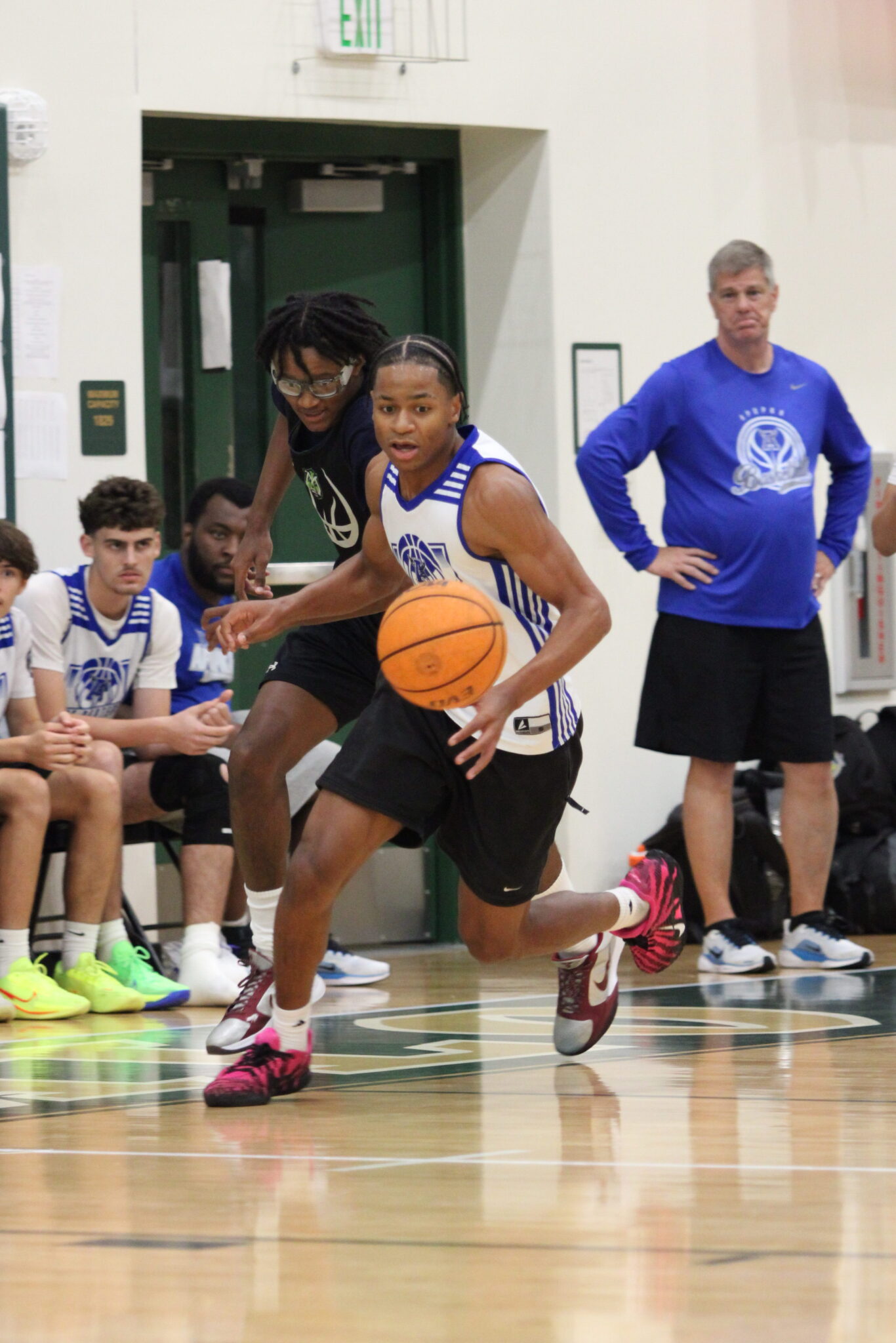 Xavier Freeman attacks a loose ball to get a fastbreak opportunity.
