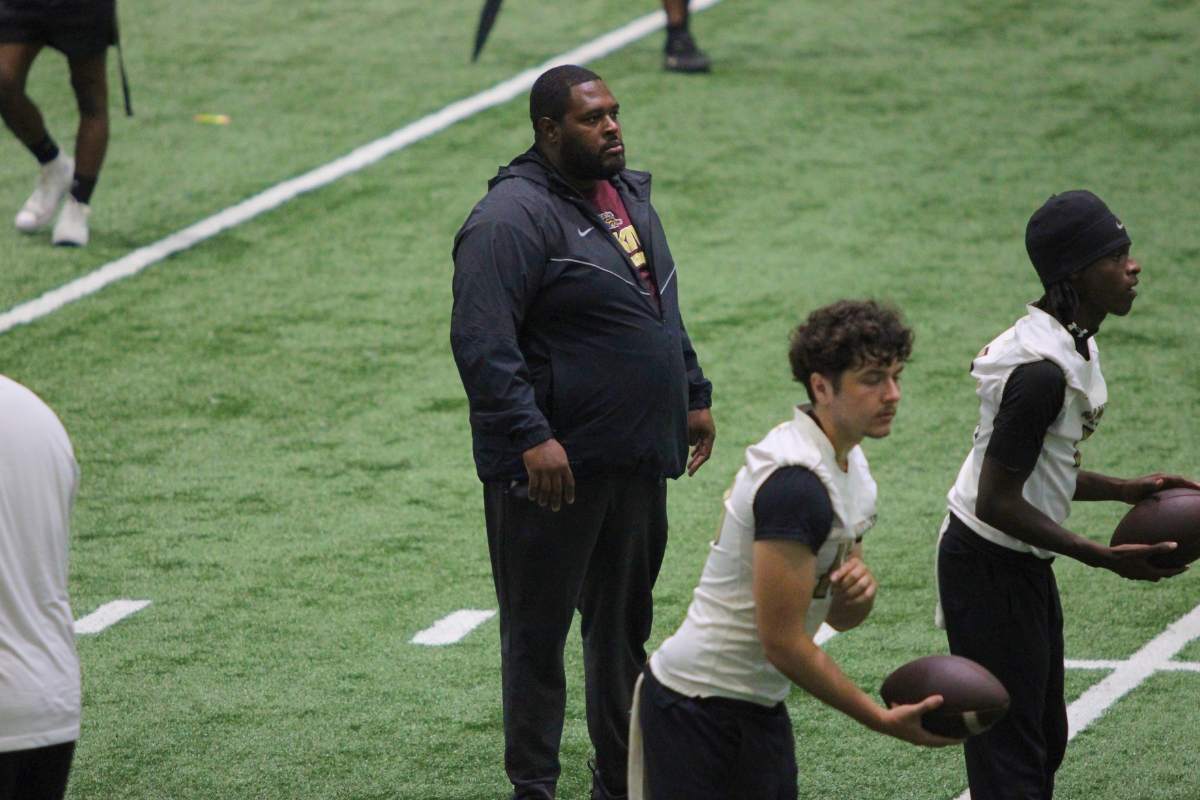 Coach Watts watches over the Mustangs offense in 7-on-7 competition at UCF.