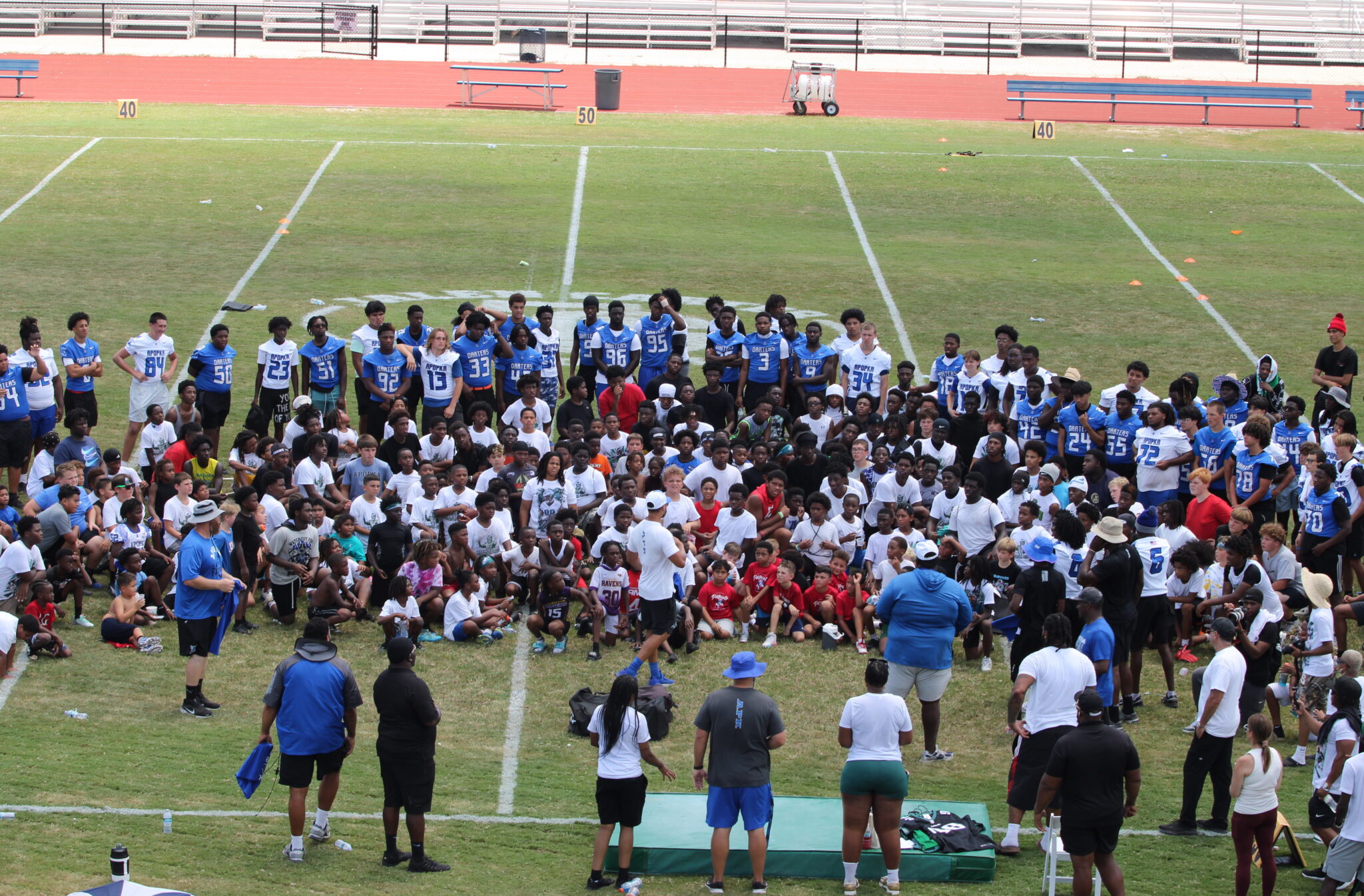 Jalen Carter camp coaches and athletes gather at the end of camp.