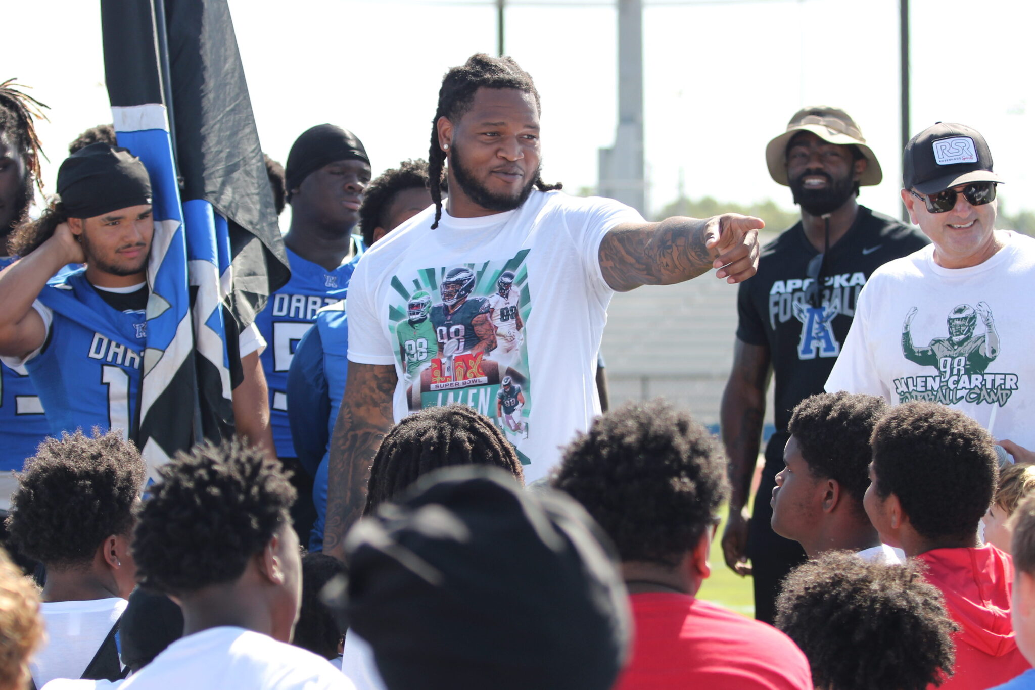 Jalen Carter points out some familiar campers that he remembers from prior camps.