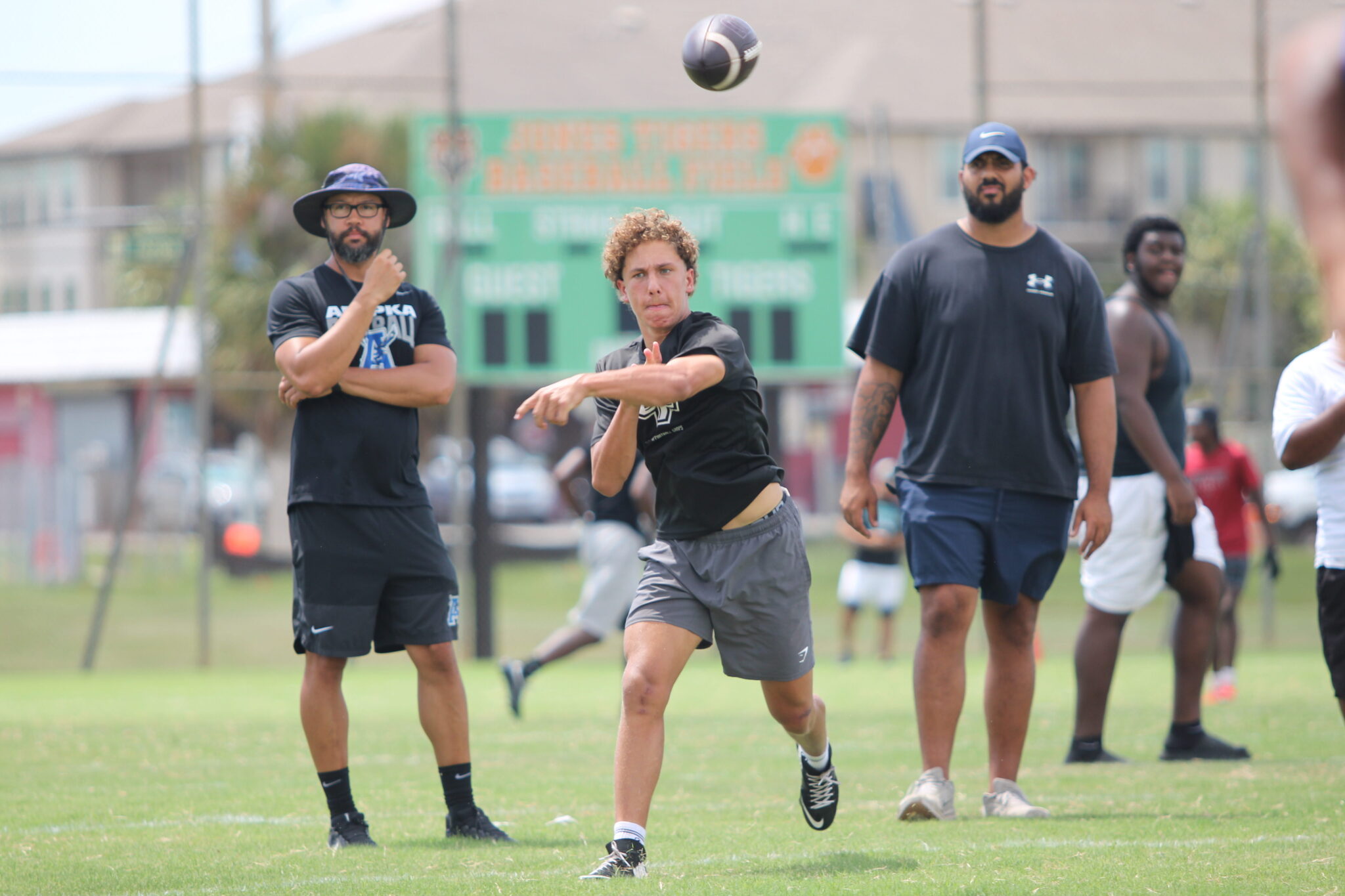 Freshman QB Kai Goodling throws a bullet pass to Xavier Cruz at the front pylon of the end zone during their final 7-on-7.