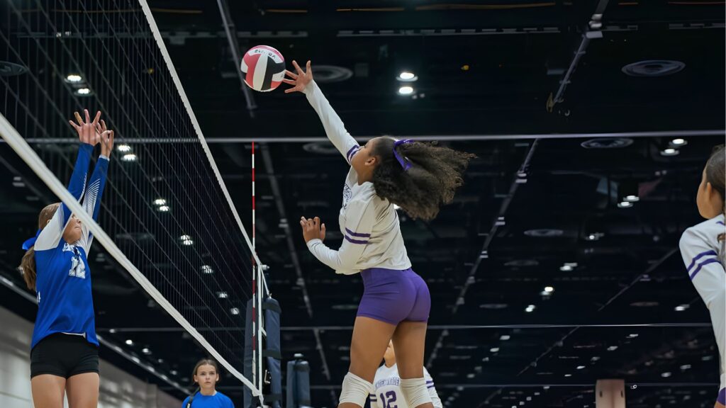 Khloie Berry smashes down a kill at the middle of the net during the junior national championship in Minnesota.Khloie Berry smashes down a kill at the middle of the net during the junior national championship in Minnesota.