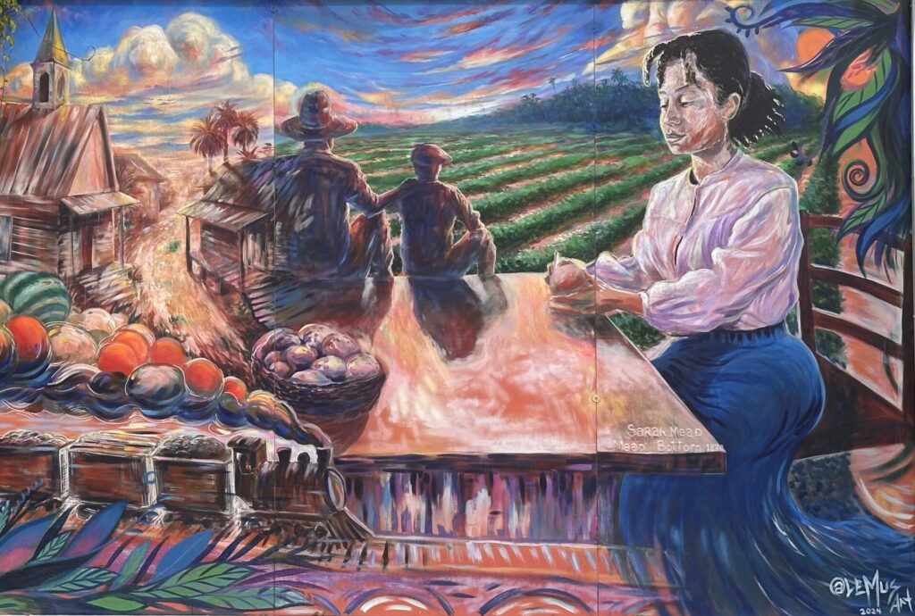 A historical panel at the Apopka City Center depicts Sarah Mead, who settled in the area around 1870 after emancipation and helped establish the Mead's Bottom community by assisting Black settlers with housing, supplies and farmland. The artwork complements the nearby Mead's Bottom mural by artist German Lemus.