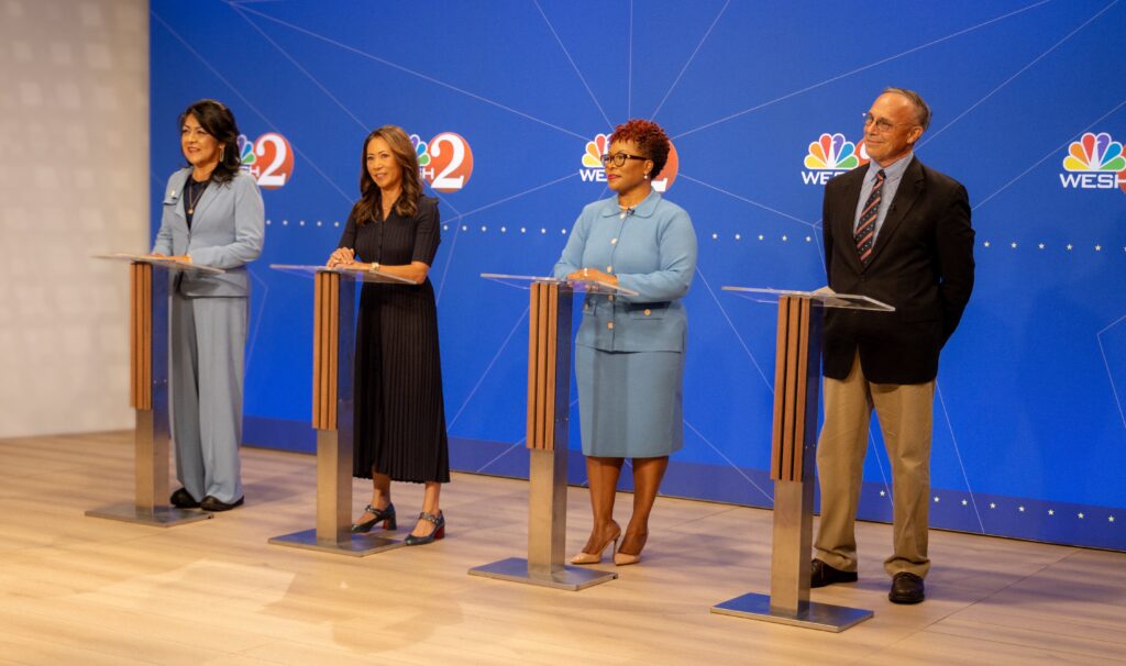 Orange County mayoral debate 2026 candidates Mayra Uribe, Stephanie Murphy, Tiffany Moore Russell and Chris Messina on stage