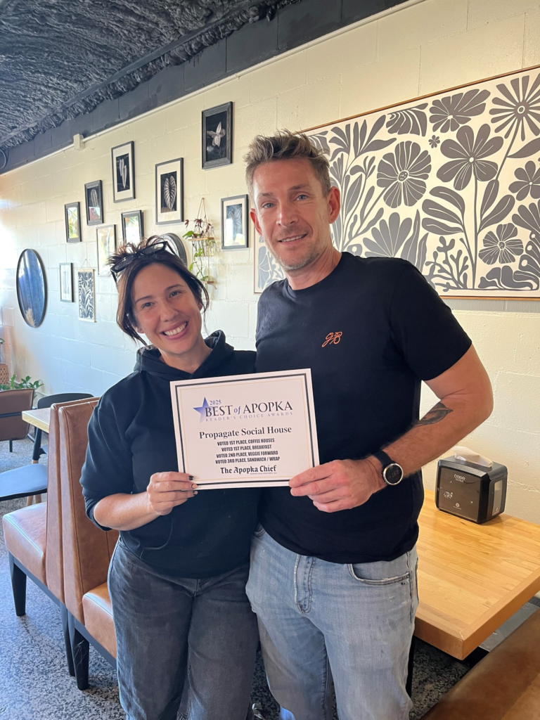 Husband and wife Jay Kleinrichert (right) and Ella Duke (left) hold the 2025 Best of Apopka certificate for Propagate Social House. Propagate won first place in the coffee houses and breakfast categories, second place in the veggie forward category, and third place in the sandwich/wrap category.