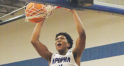 Sam Alexis attacks the rim in a matchup during his senior season at Apopka.