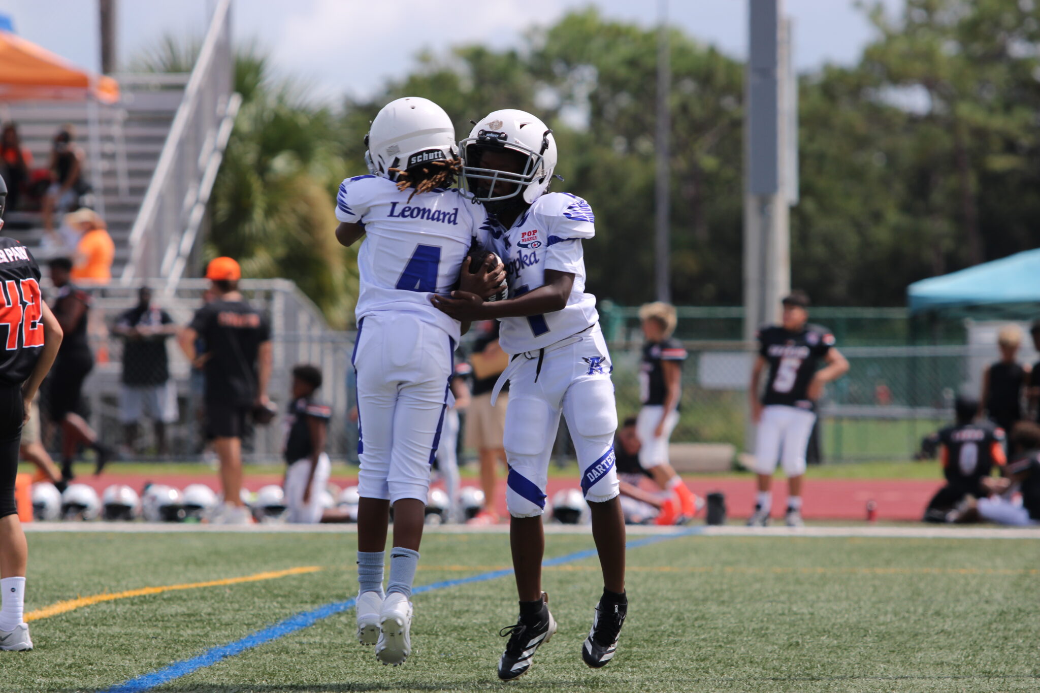 10u Blue Darters celebrate the late touchdown.