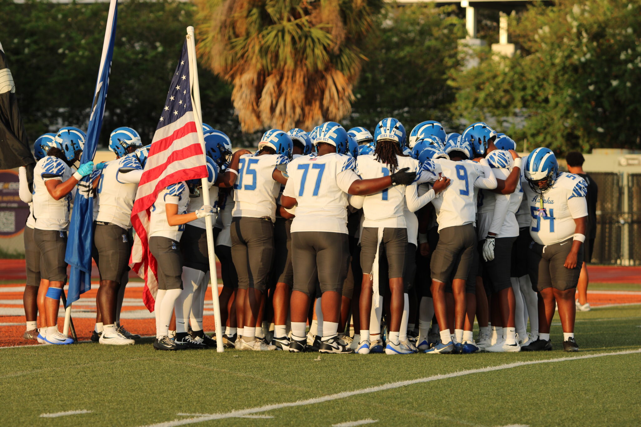 Apopka Blue Darters huddle up ahead of their game against Boone.