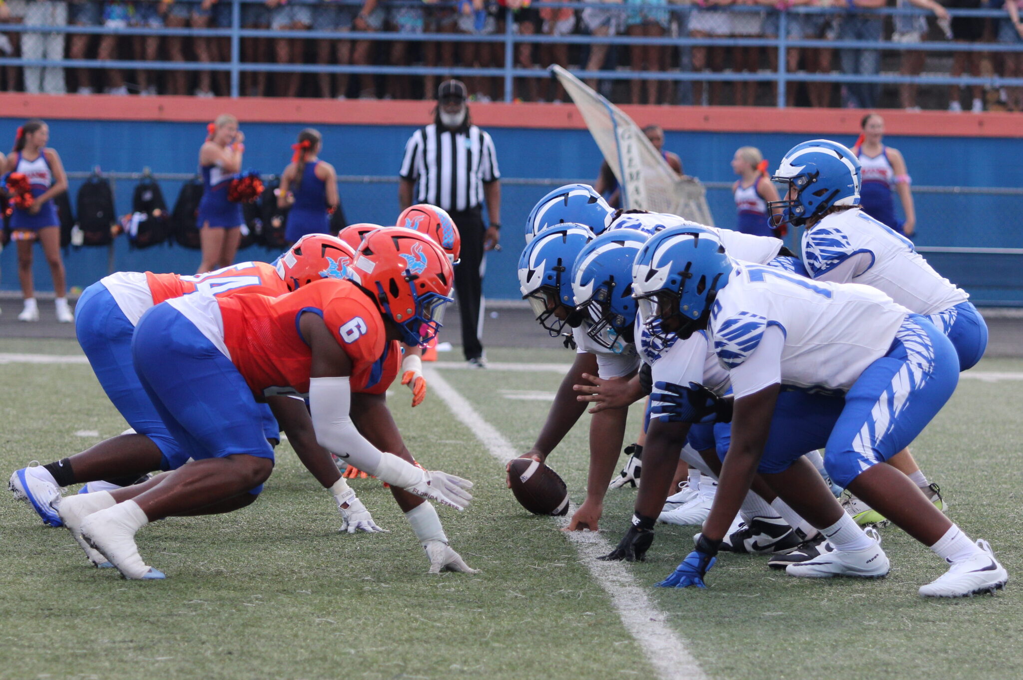 Apopka and West Orange line up for the first play of the game.