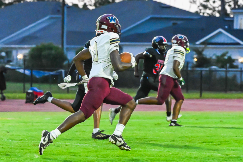 Avantae Scott returning one of two second-quarter punts for a touchdown against Lake Buena Vista.