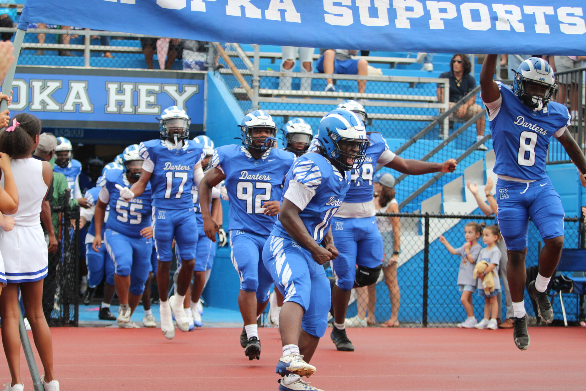 Blue Darters run out of the tunnel for their first home game of the 2026 season against Winter Park.