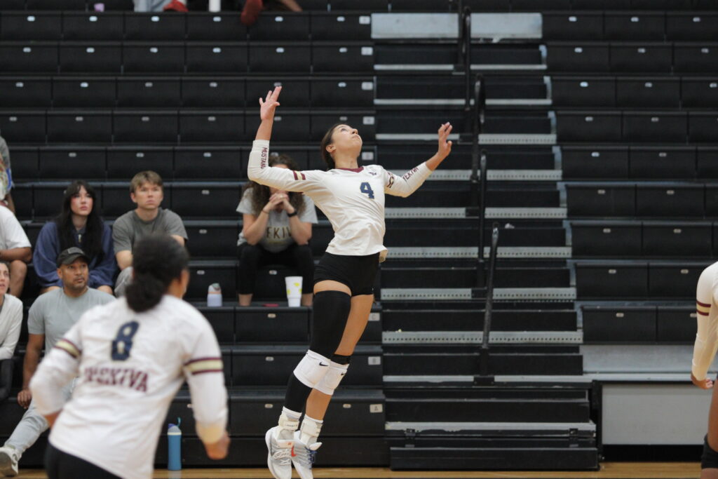 Elyanna Sanchez rises for a kill attempt.