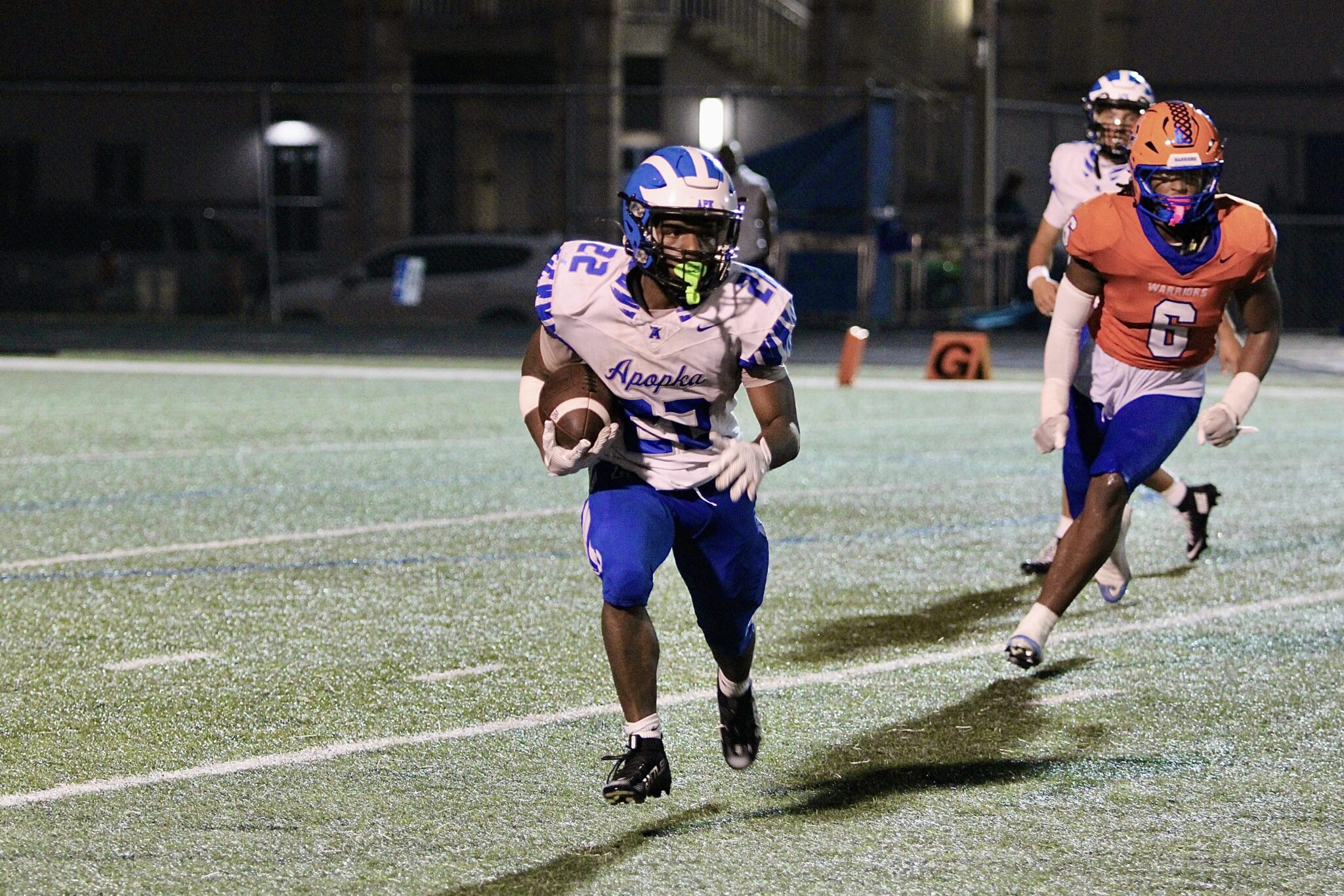 Jakyvion Kemp sprints around the edge against West Orange.