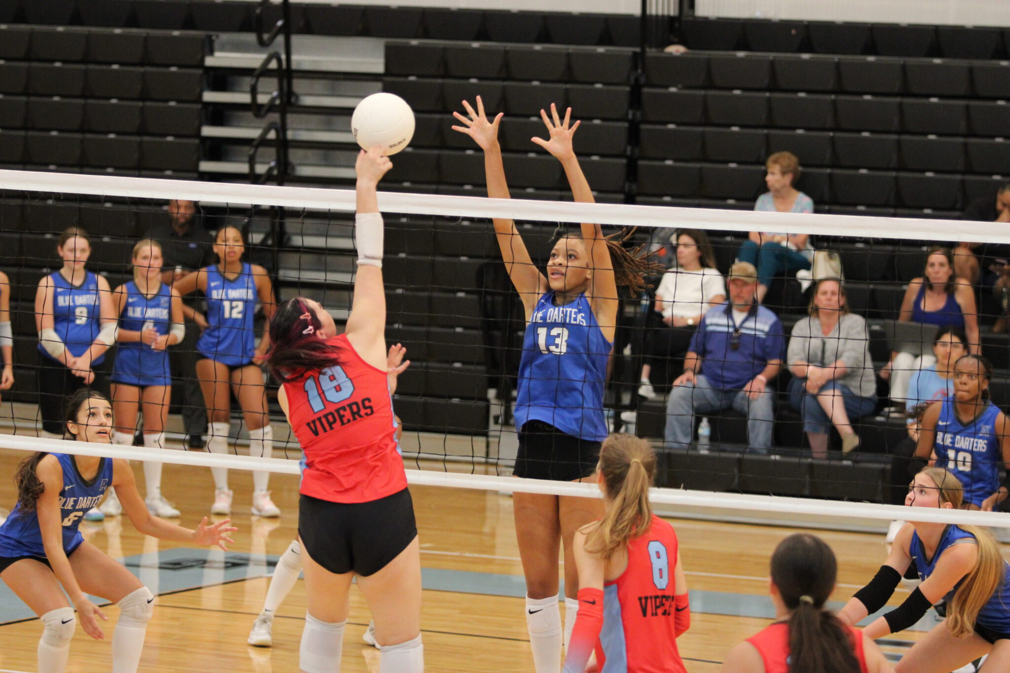 Kierra Taylor rises up in the middle of the net.