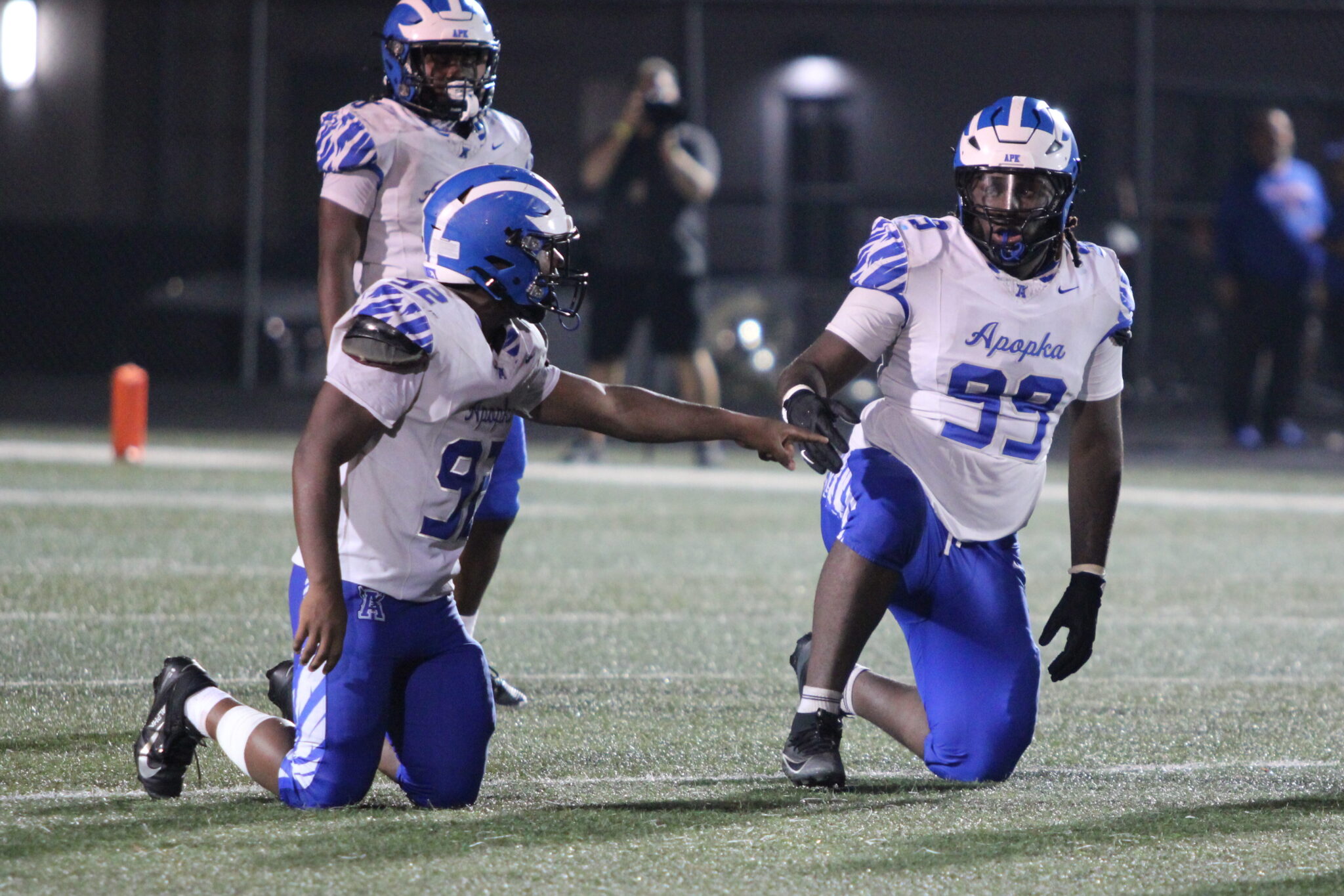 Marcus Young and Demetri Tarpley communicating on defense.