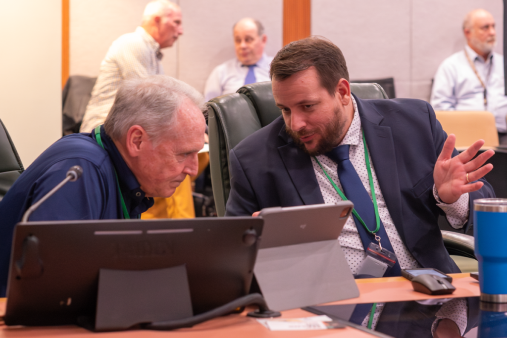 Interim City Administrator Radley Williams, right, speaks with City Attorney Cliff Shepard during an Apopka City Commission meeting May 20. Williams presented background on the Kelly Park Road Pioneering Agreement during the commission's Wednesday workshop.