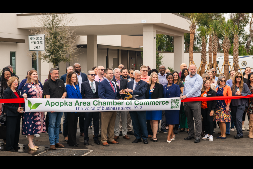 Members of the Apopka Area Chamber of Commerce and community representatives gather for a ribbon-cutting ceremony earlier this year. The chamber will host a Business After Hours networking event Thursday, Aug. 27, at Hurricane Grill & Wings Apopka, with a portion of checks benefiting Lighthouse Leaders at Wekiva High School.