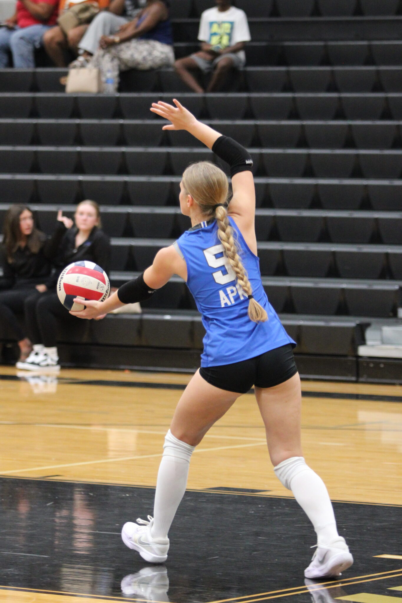 Victoria Polusmak on serve to finish the game against Ocoee.