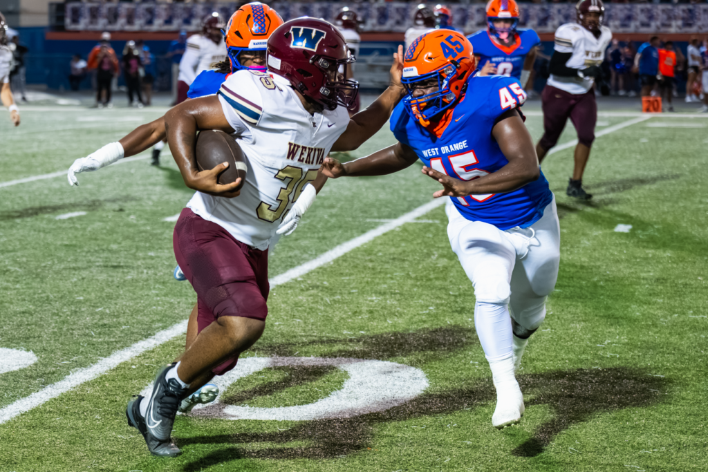 Ya'Terrius Jackson looks for running room Friday night against West Orange.