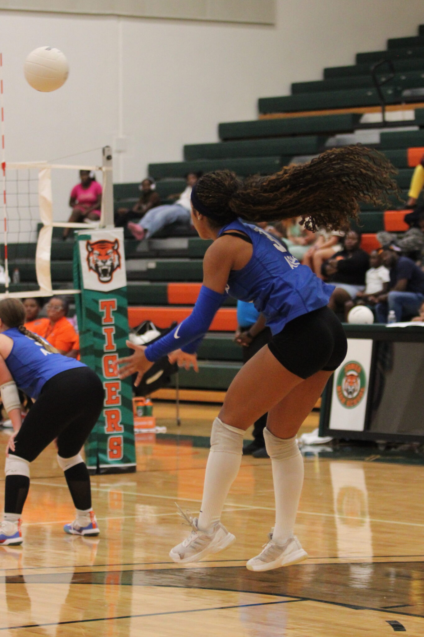 Kiana Napier sends a serve to Jones in the third set.