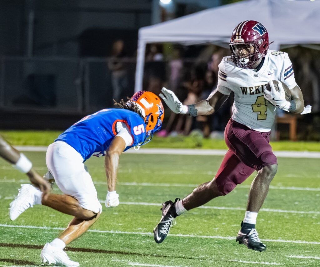 Landon Jerome evades a West Orange defender Friday in Winter Garden.