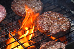 How about a good grilled burger with the works and potato salad?