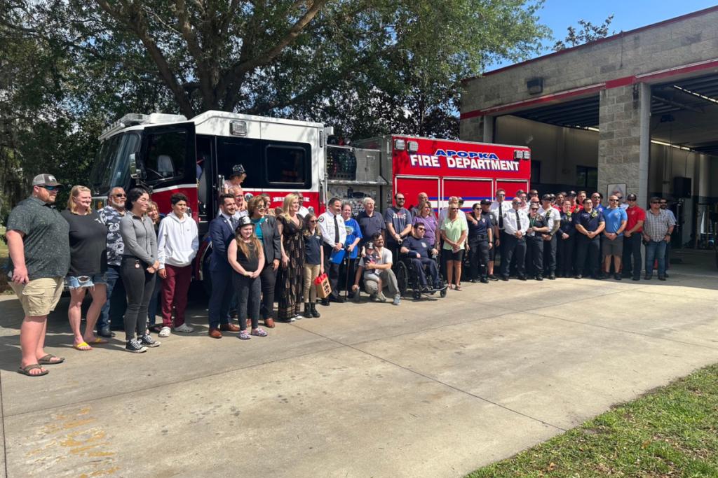 Apopka firefighters, city officials and community members gather during a previous Fire Department event in front of an Apopka fire engine. The City Commission unanimously ratified a new three-year collective bargaining agreement with Apopka Professional Firefighters Association Local 5293 on Sept. 24, approving raises, pension changes and new pay incentives through September 2029.