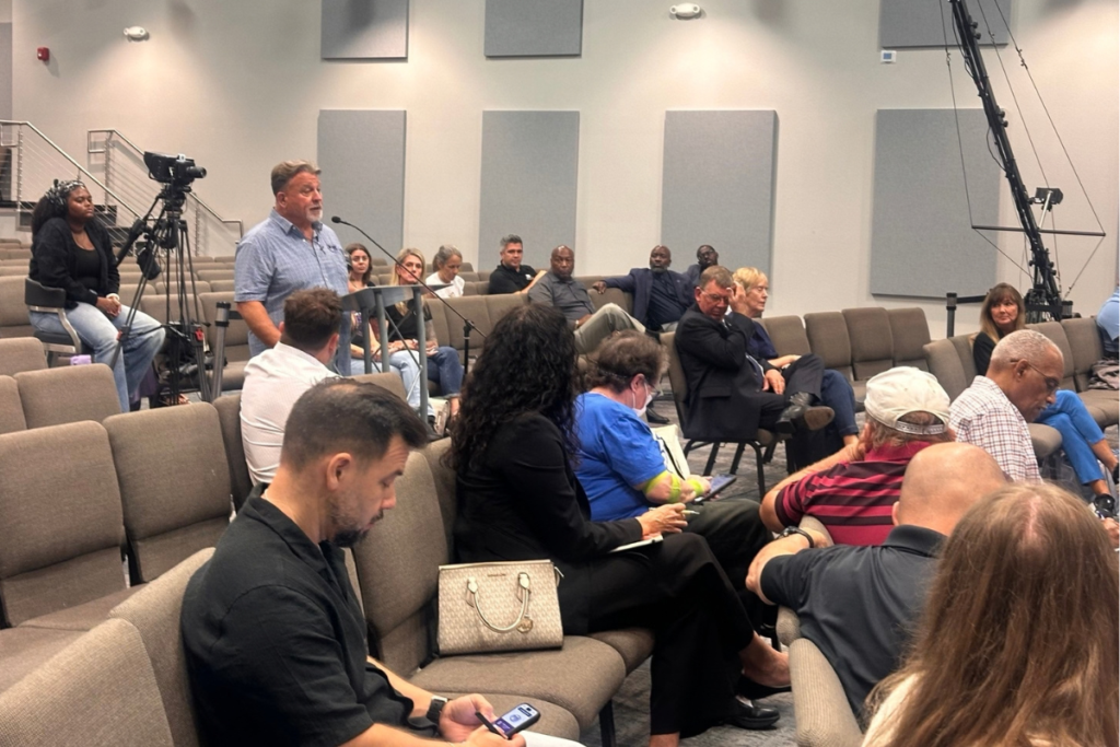 Scott Billue, founder of Matthew’s Hope, speaks during the Apopka Homeless Services Town Hall on Sept. 24 at The Well Activity Center. Billue discussed the nonprofit’s work in Apopka and its plans to bring a sleeper bus to the area.