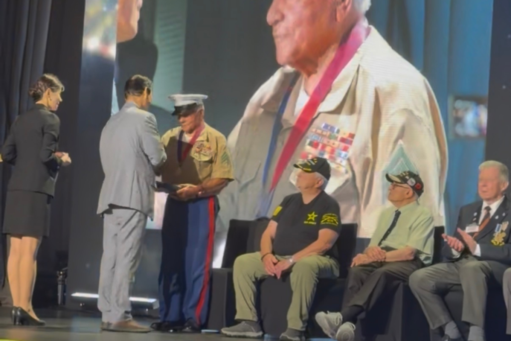 Lou Boria receives his Ambassador for Peace medal.
